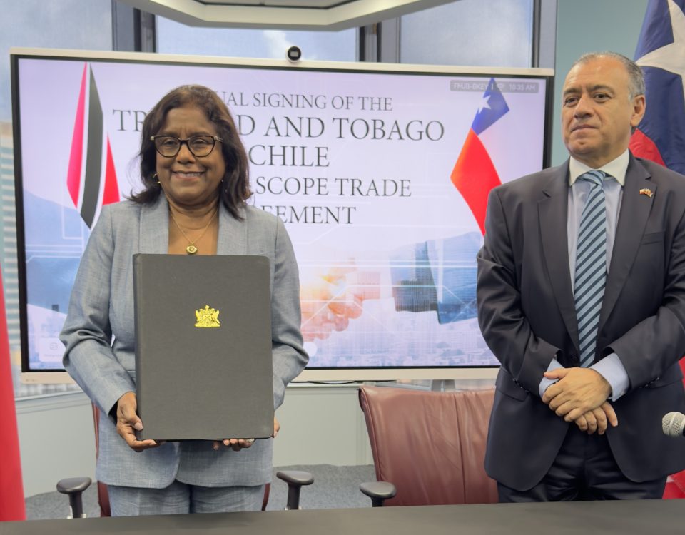 Minister of Trade and Industry, the Hon. Paula Gopee-Scoon and His Excellency Hernán Núñez Montenegro, Ambassador Extraordinary and Plenipotentiary of Chile to Trinidad and Tobago at the signing of a new Partial Scope Trade Agreement (PSTA) with the Republic of Chile at the Ministry's Head office in Port of Spain.